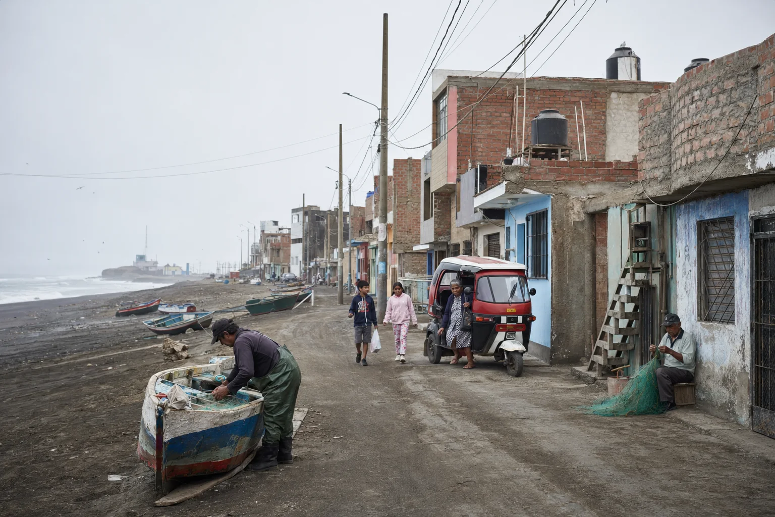 Viviendas, pescadores y embarcaciones junto a la costa de El Faro